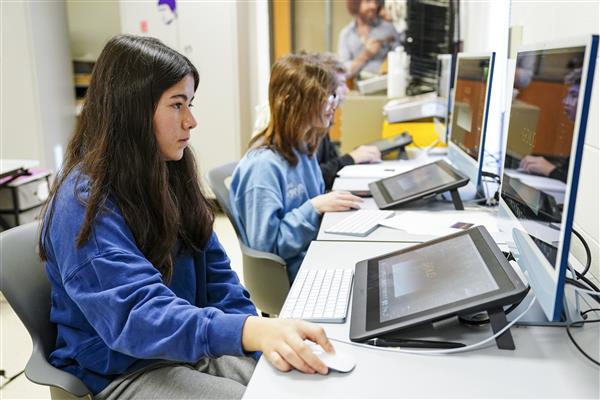 Commercial Art and Advertising Design students working on computers
